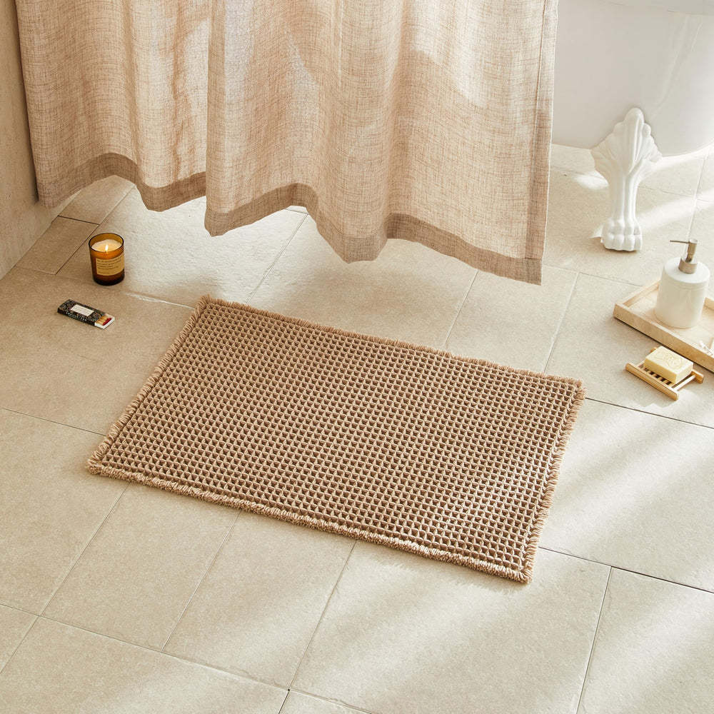 TYUU waffle bath mat front view showing khaki color and boho style for cozy comfort
