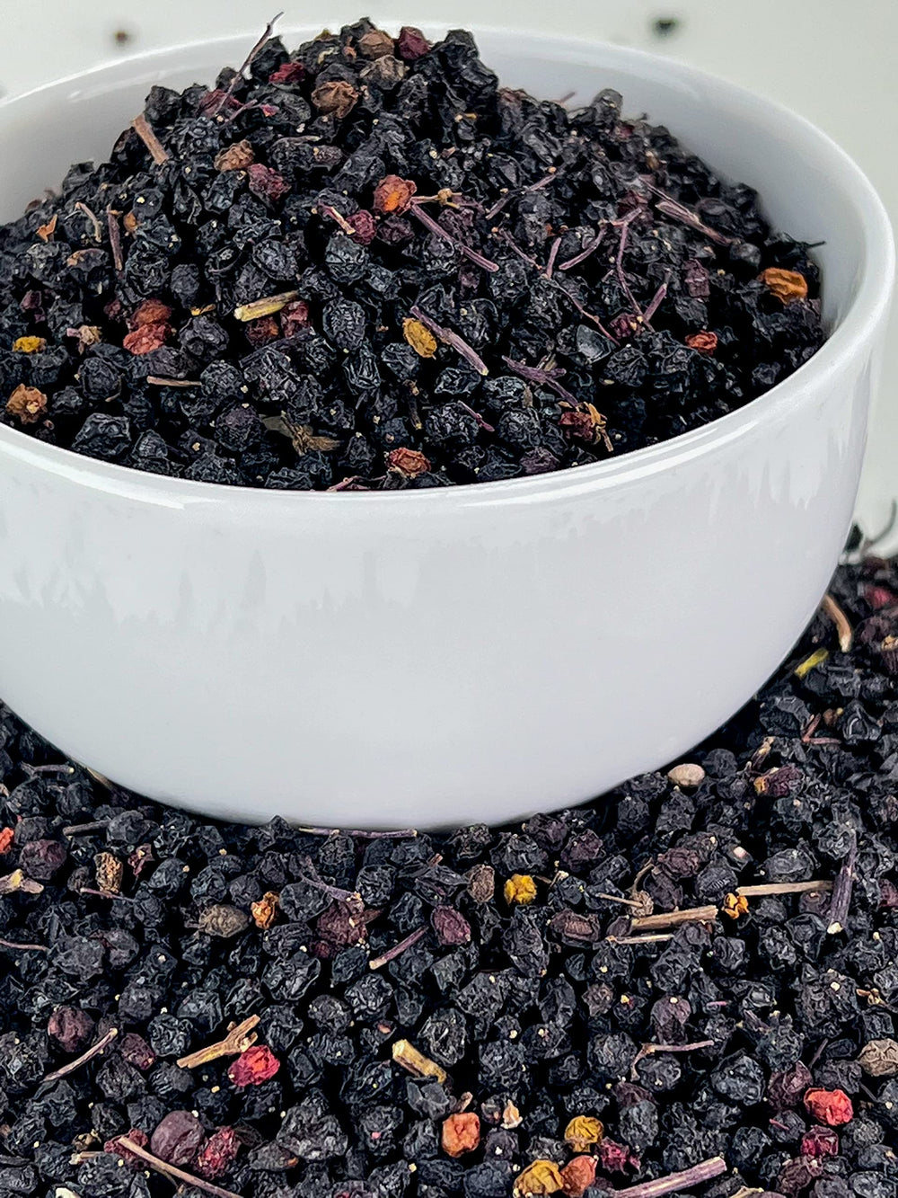 U.S. Wellness Naturals elderberry tea poured into cup illustrating easy beverage preparation