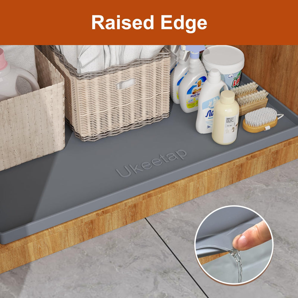 ukeetap raised edge detail containing liquid to protect floors and cabinets