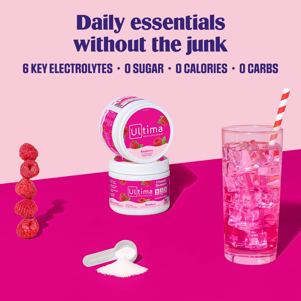 Ultima Replenisher open canister revealing raspberry electrolyte powder for quick use
