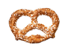 Unique Snacks pretzel held over dip showing brand-friendly shape that grips spreads for snacking