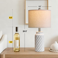 USumkky lamp on bedroom nightstand styled to create warm cozy bedside ambiance