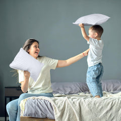 Utopia Bedding toddler pillow next to ruler showing 13x18 inch size benefit easy case compatibility