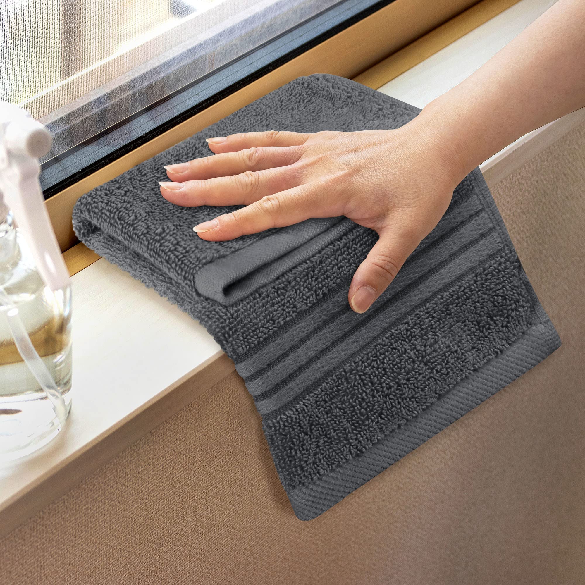 Utopia Towels folded stack on shelf showing neat storage and organized rotation