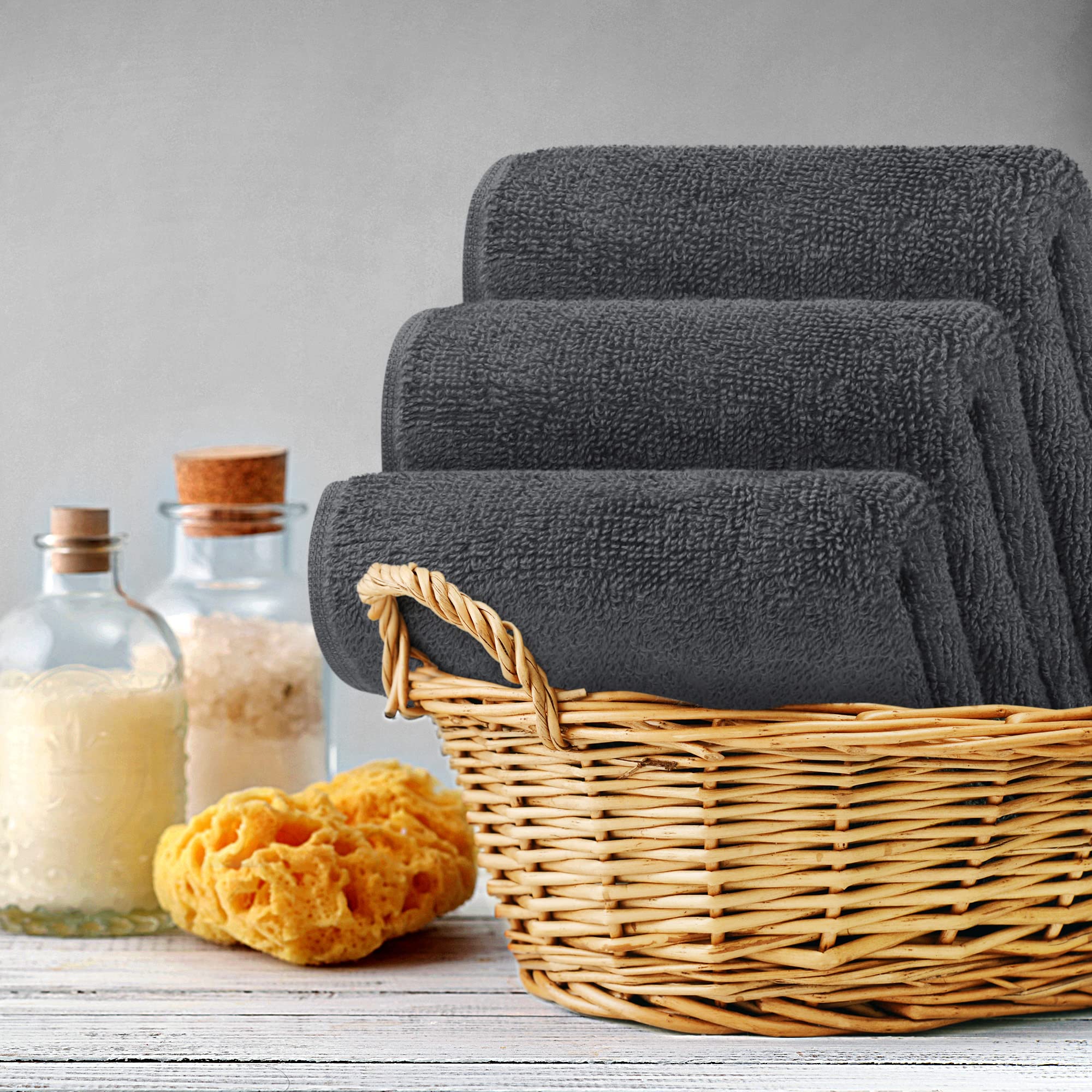 Utopia Towels drying face to show gentle softness and quick absorbency benefit