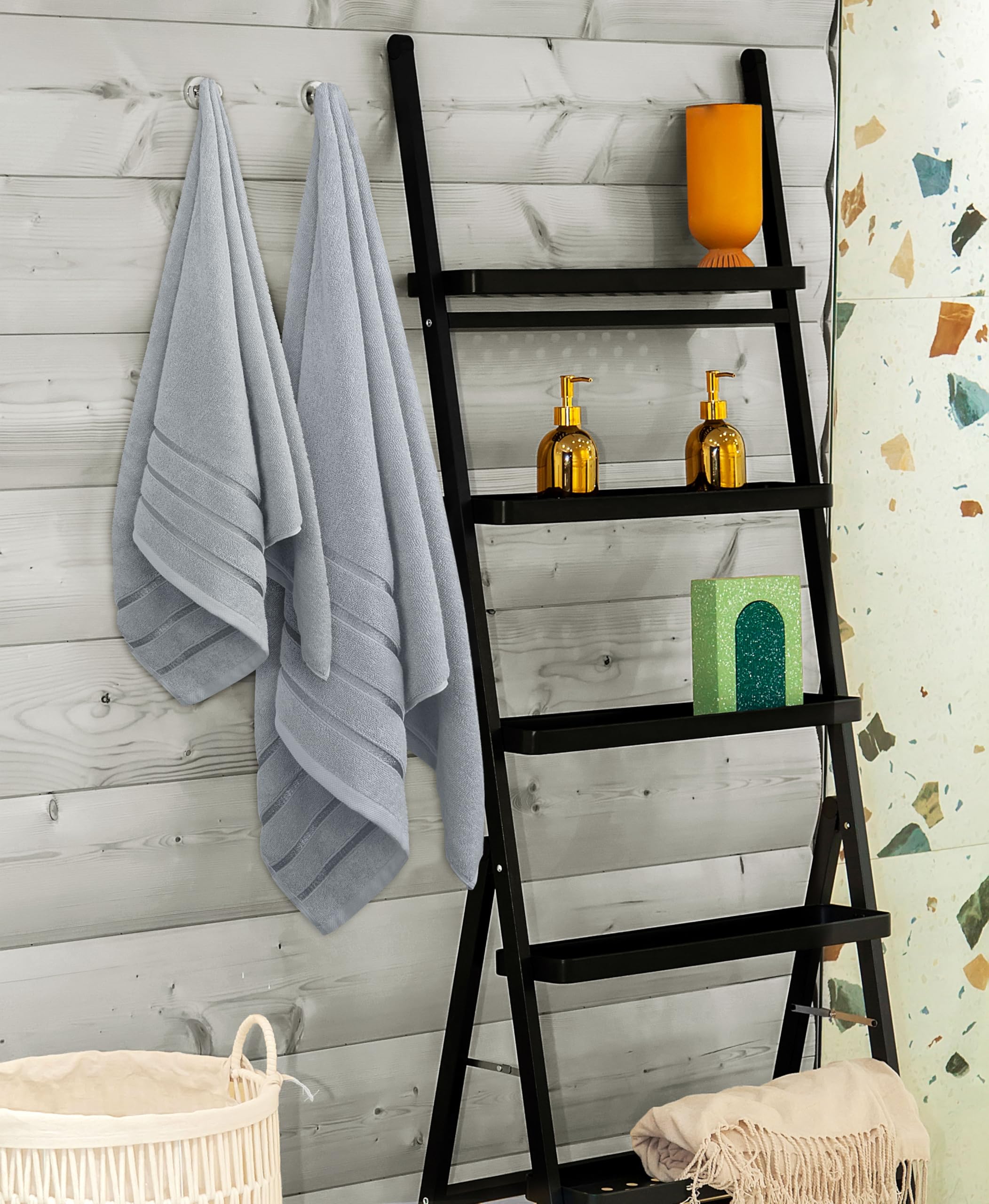 Utopia Towels styled in a modern bathroom to show how the cool grey stripe complements décor