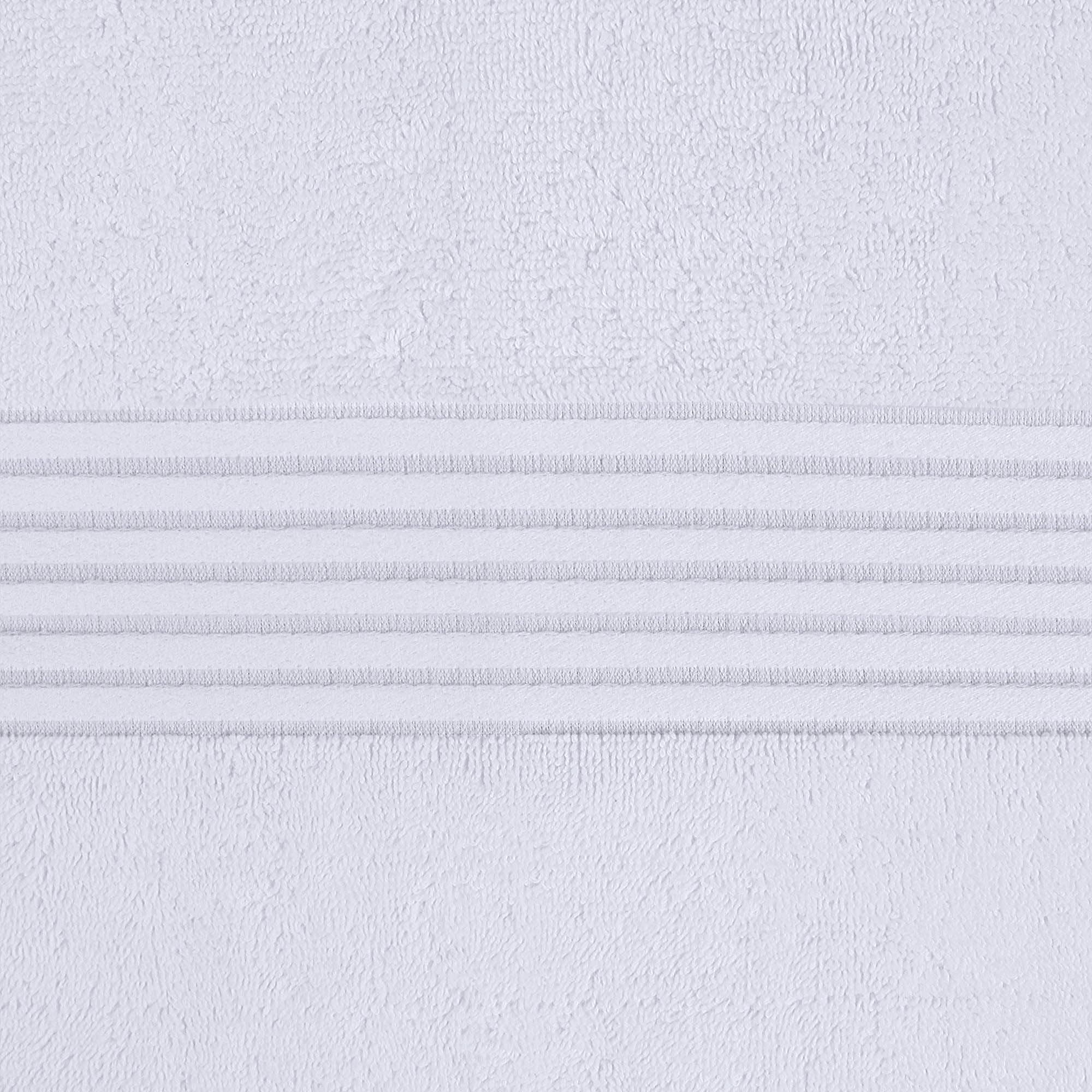 Utopia Towels towel beside ruler illustrating 27x54 inch size and full-body coverage benefit