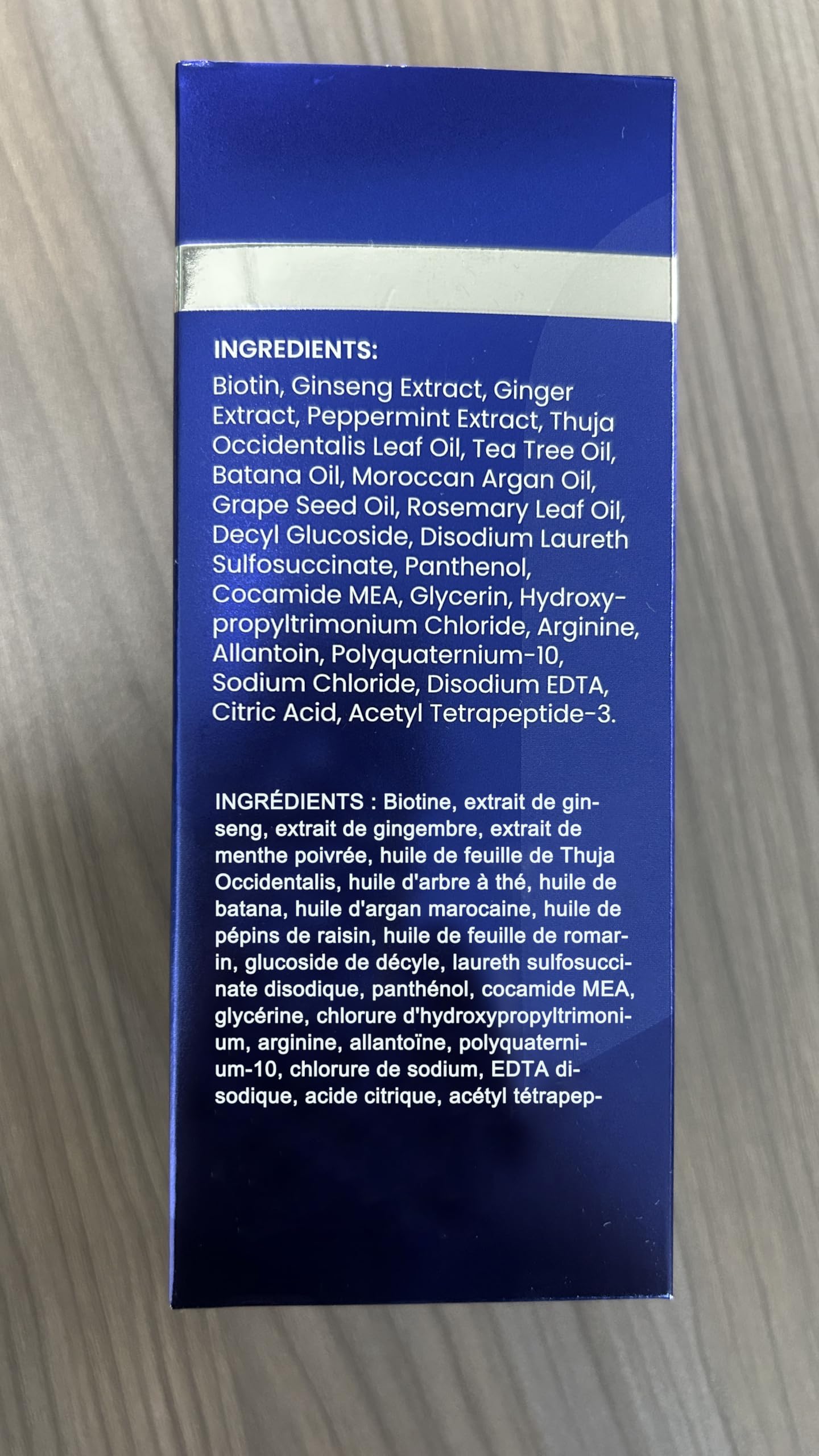 uttse shampoo with ginseng rosemary and tea tree on display, showcases active botanicals