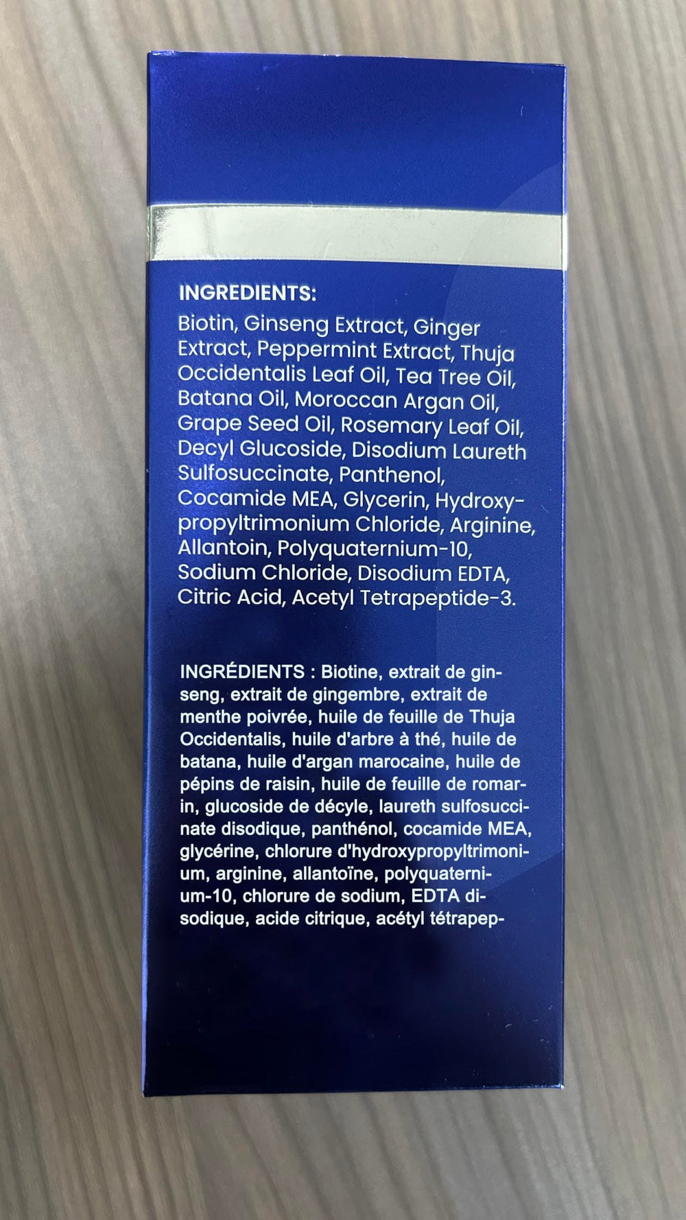 uttse shampoo with ginseng rosemary and tea tree on display, showcases active botanicals