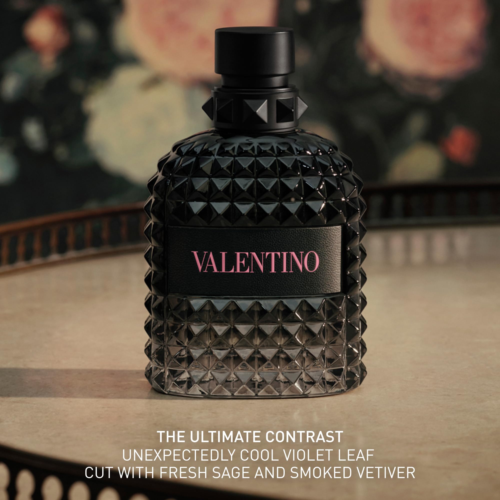 Valentino cap and neck detail showing secure closure and refined finish