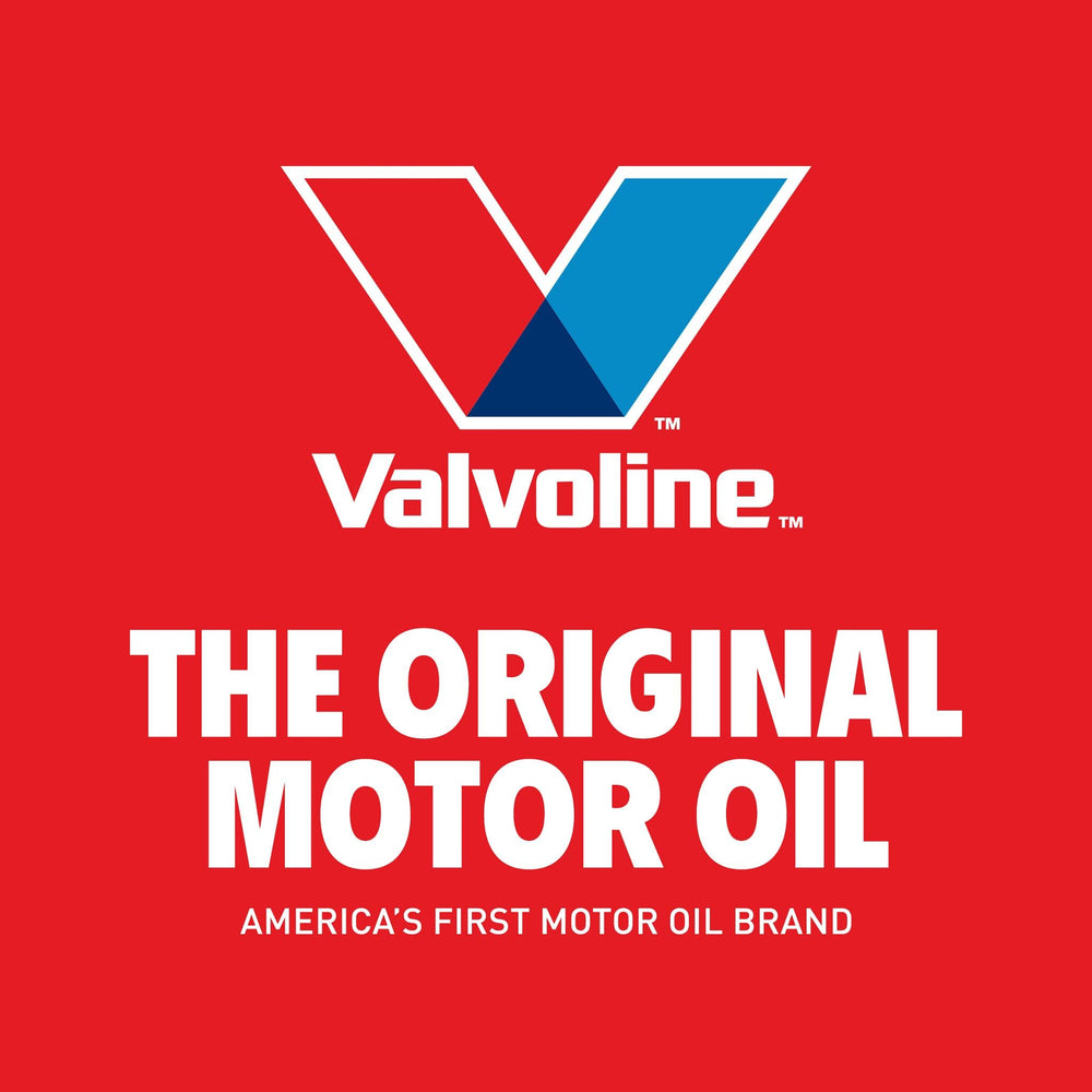Valvoline bottle on a garage workbench during oil change demonstrating use