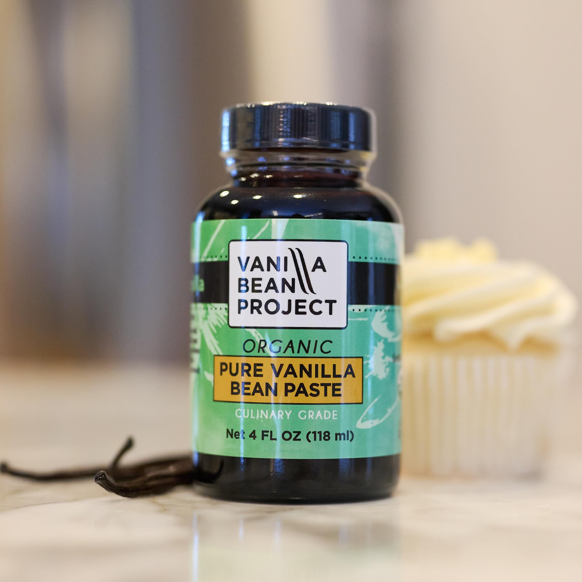 Display of paste with vanilla pods and ingredients showing brand and clean-label composition