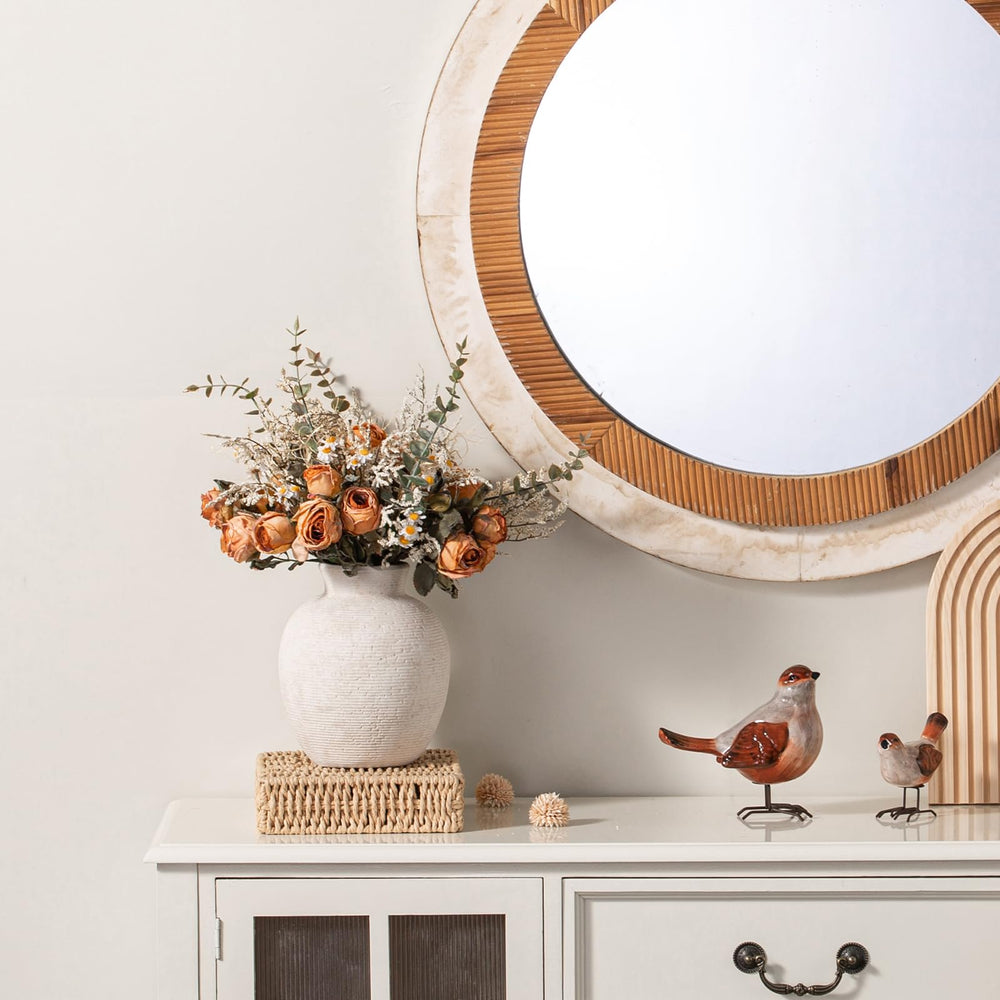 Vanselia styled on bookshelf with decor accents elevates shelf styling