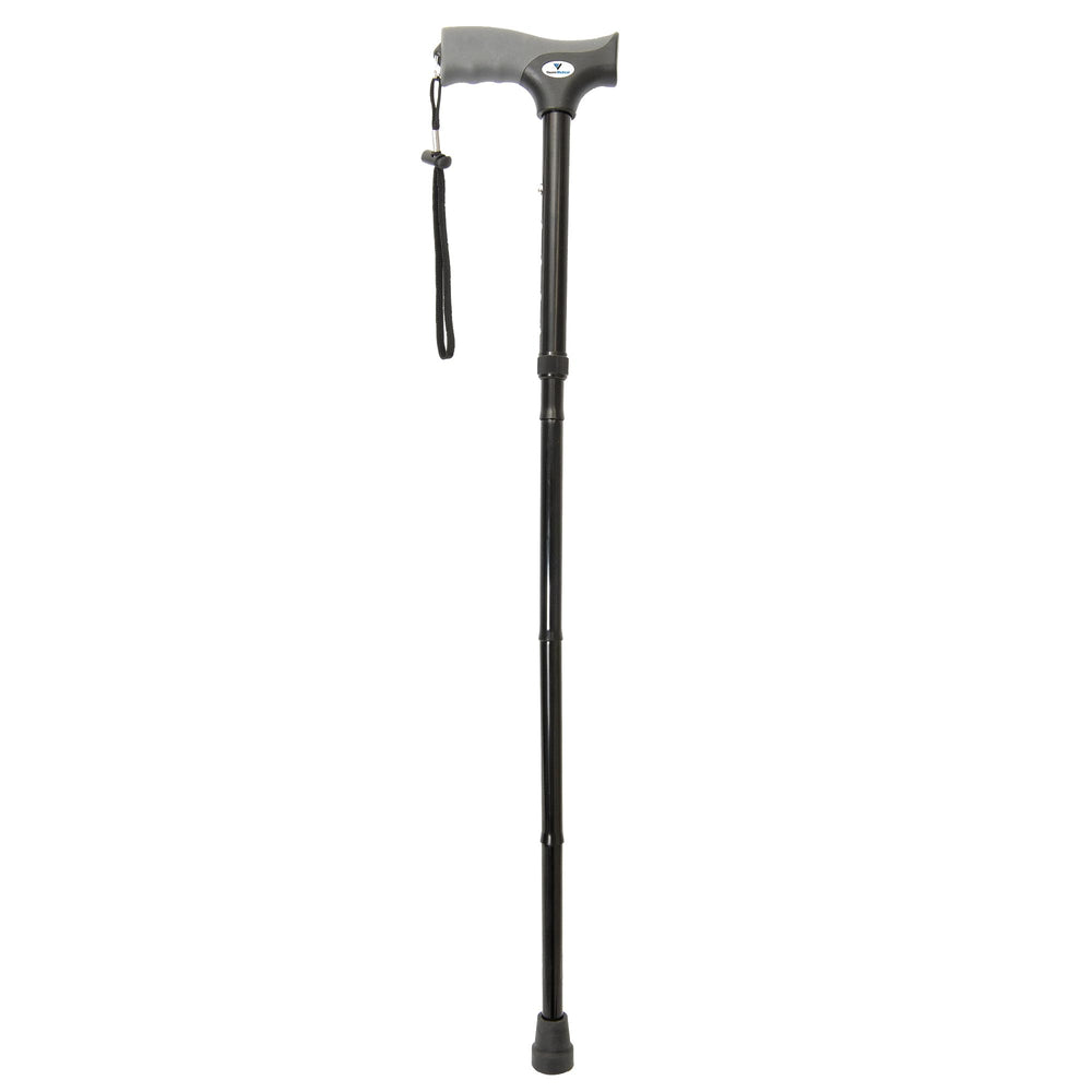 Vaunn walking cane in use on pavement showing confidence and balance