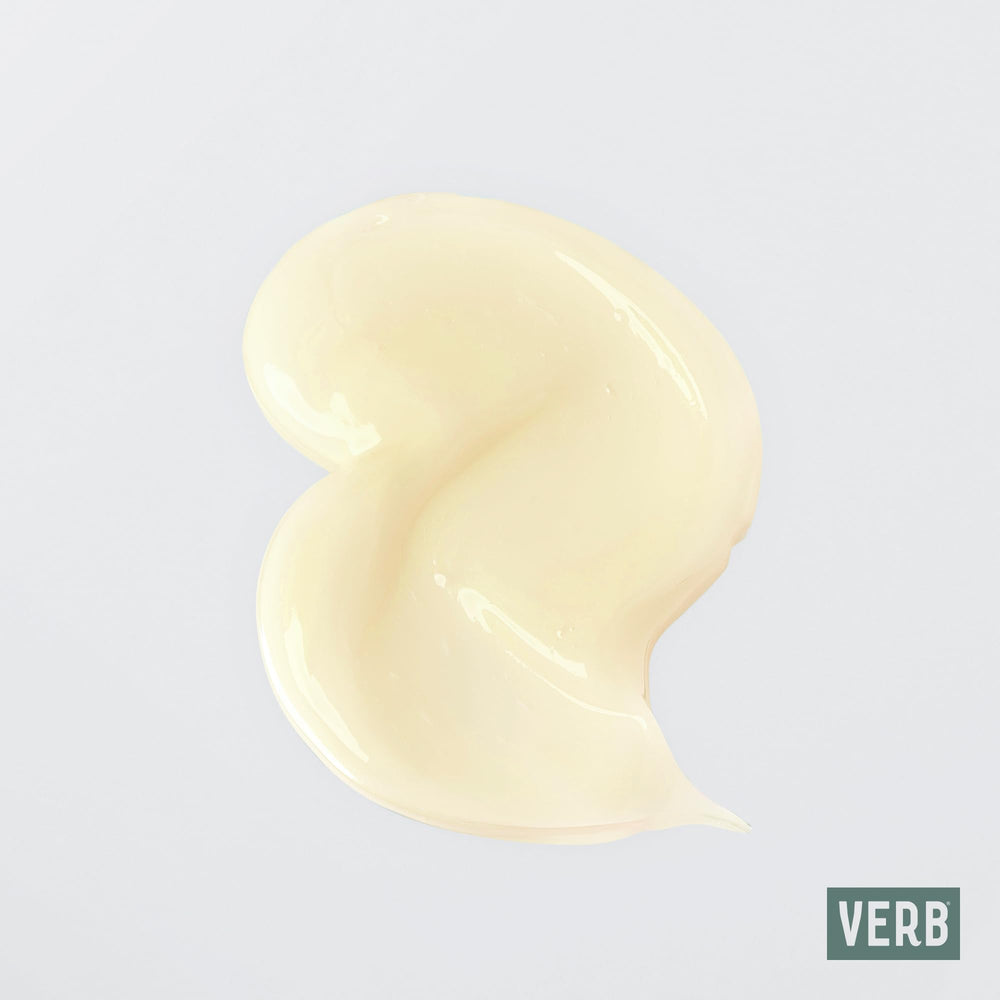 VERB curl cream size comparison next to hand to show 5.3 oz scale for travel and storage