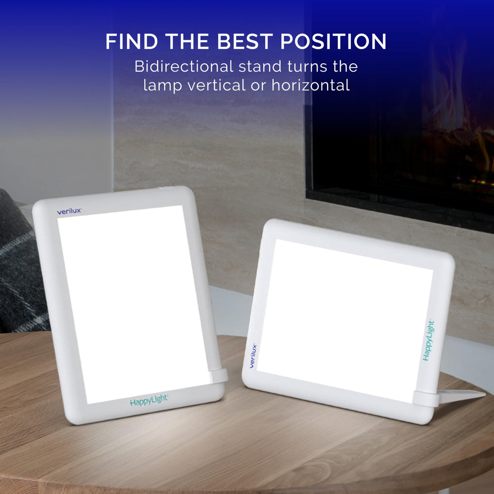 Verilux HappyLight Lucent on a bedside table offering easy morning light exposure before starting day