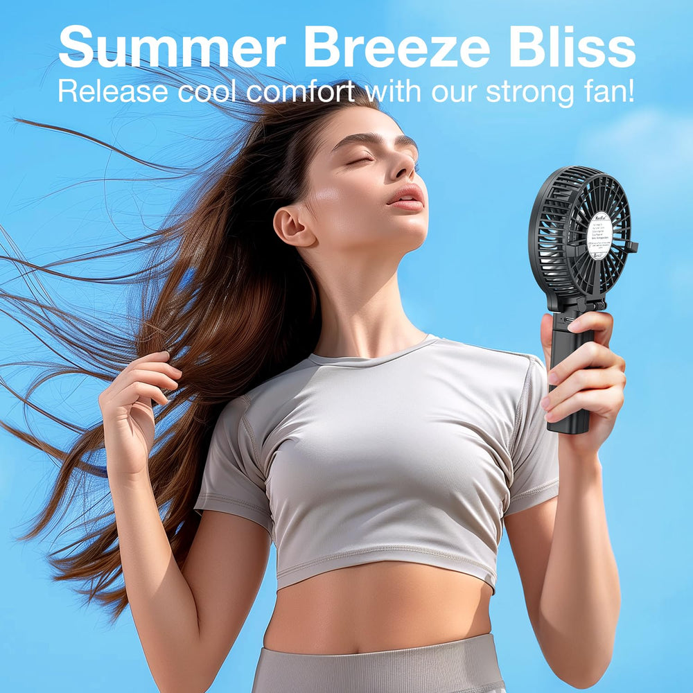 VersionTECH handheld during outdoor use, portable personal cooling benefit