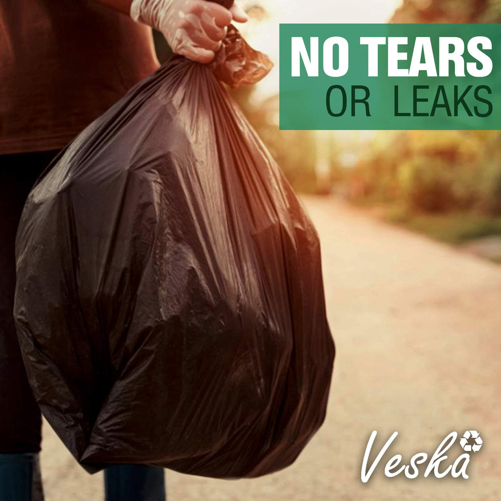 Veska bag holding wood scraps and nails to show tear resistance
