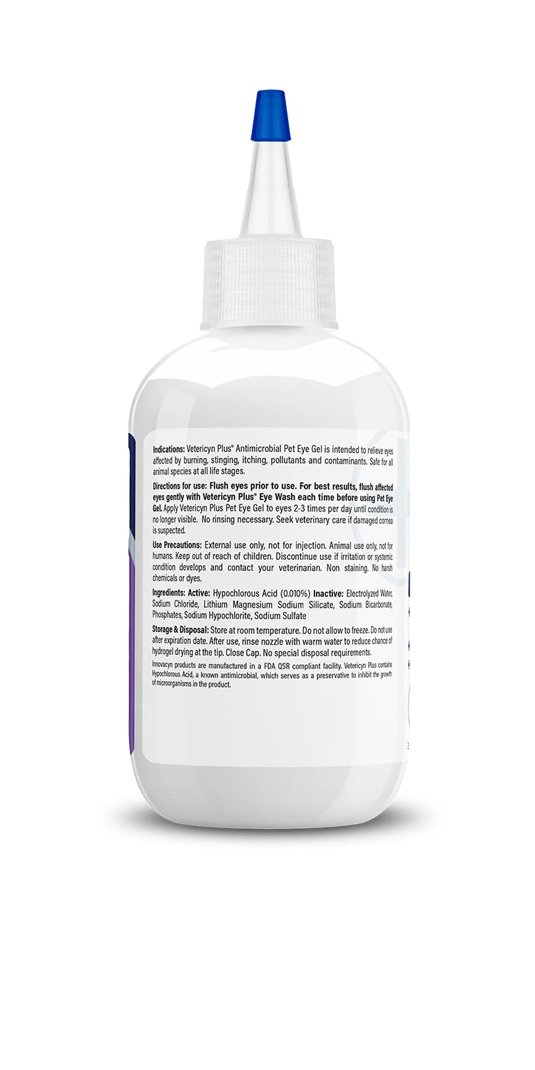 Applying Vetericyn gel to a dog eye to soothe irritation and reduce rubbing
