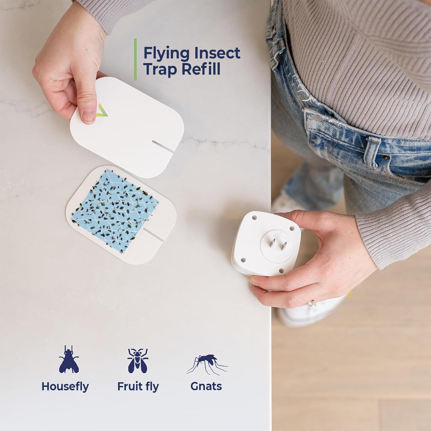 VEYOFLY refill beside a coin showing compact size and practical fit