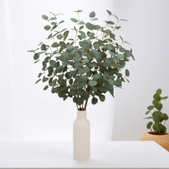 VGIA styled vase centerpiece with eucalyptus stems adding effortless greenery benefit