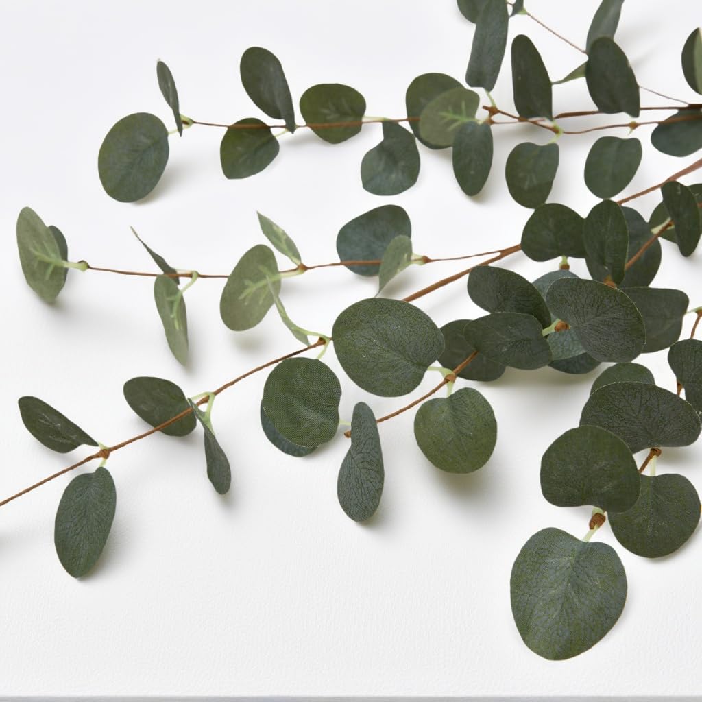 VGIA eucalyptus stems used on a wedding aisle creating lasting greenery without maintenance benefit