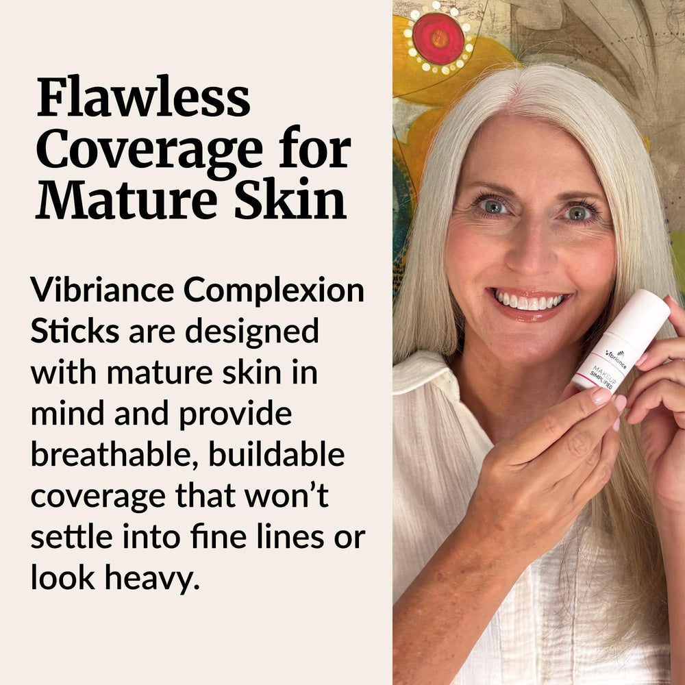 Vibriance mature woman applying stick showing quick routine and natural glow benefit