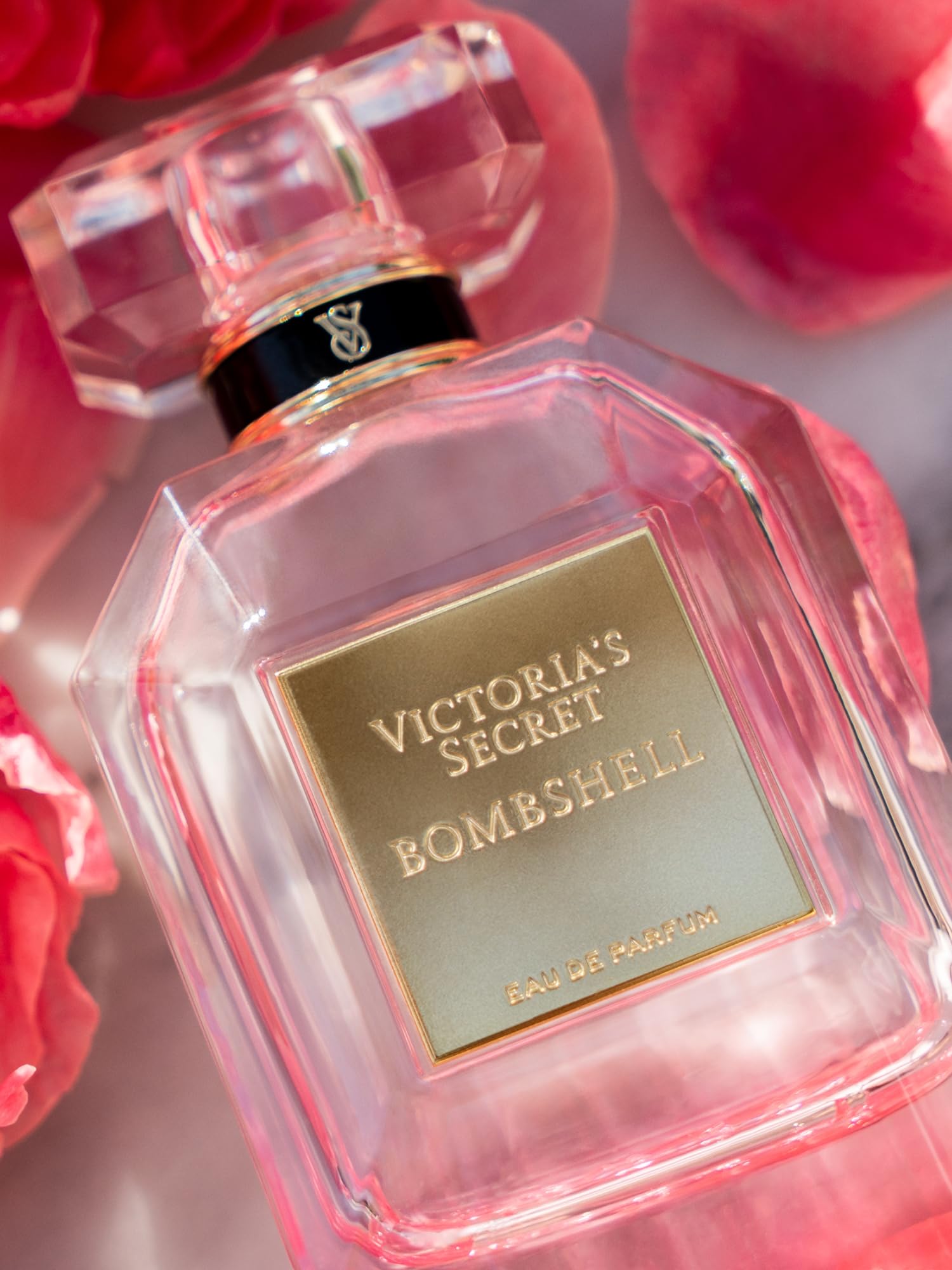 Victoria's Secret Bombshell liquid close-up emphasizing rich fragrance concentration and clarity