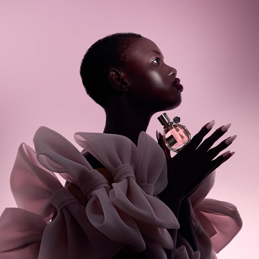 Viktor&Rolf on vanity with flowers illustrating lifestyle use and aesthetic display