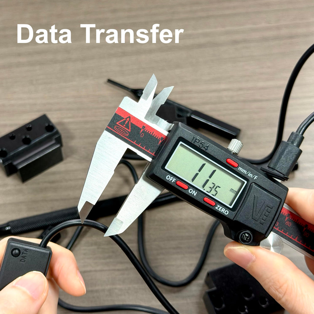VINCA caliper in hand for scale showing compact size and ergonomic handling benefits