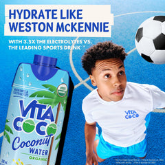 Vita Coco carton in hand showing easy single-serve convenience and portability