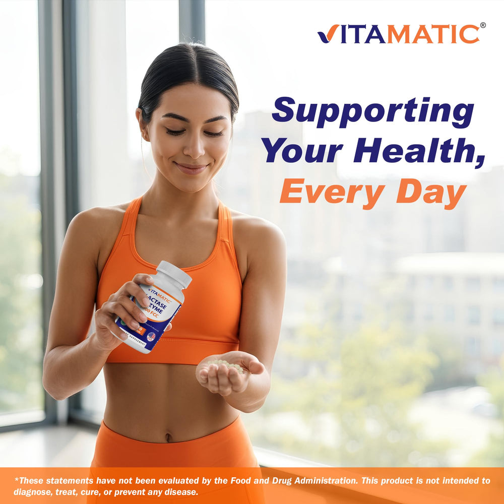 Hand holding a Vitamatic caplet ready to take, showing practical everyday use and convenience