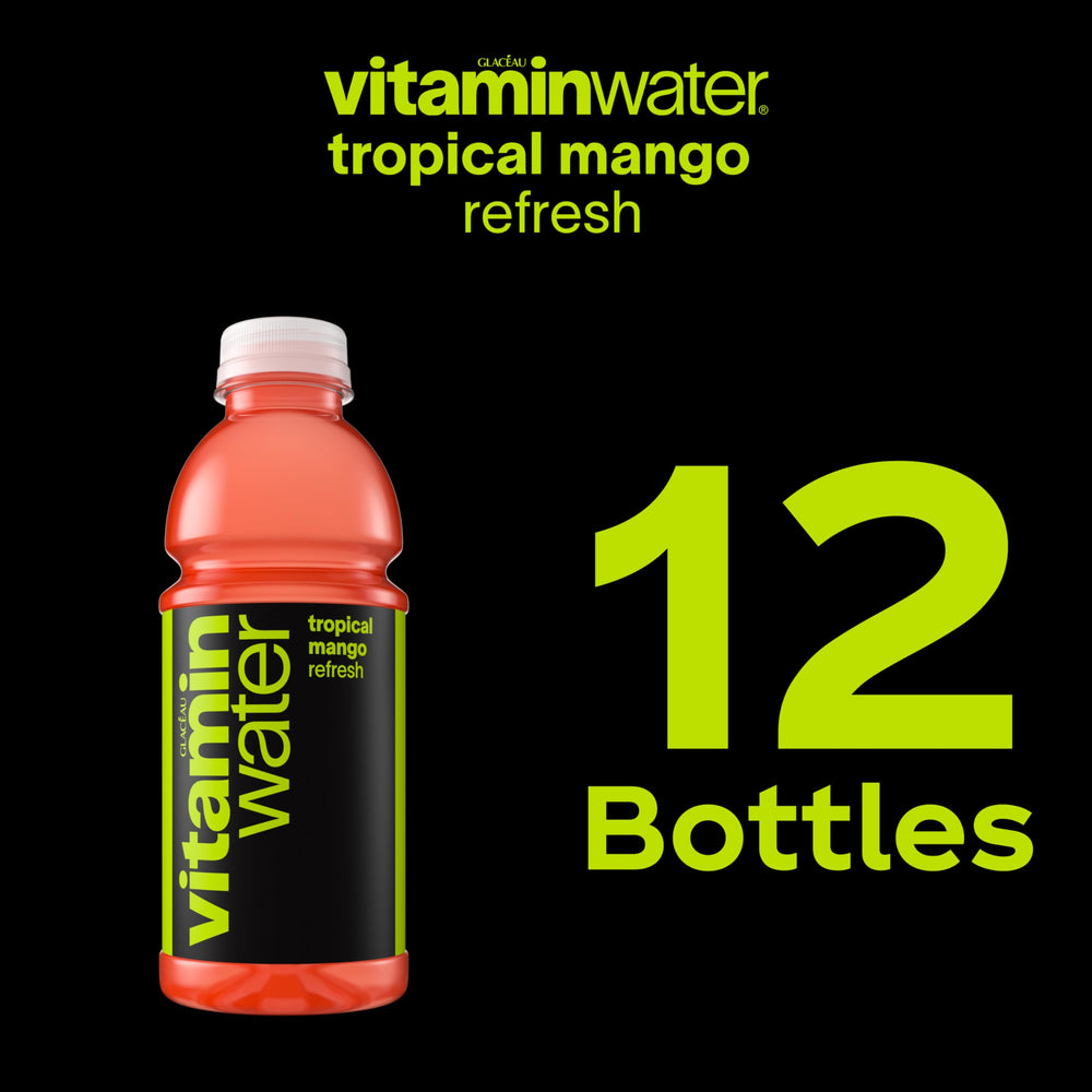 vitaminwater beside phone and notebook for on-the-go workplace refreshment