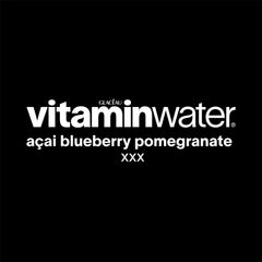 vitaminwater bottle in hand demonstrating portable 20 fl oz convenience