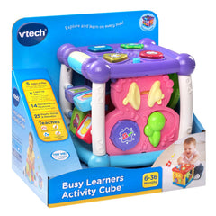 VTech Busy Learners Activity Cube on floor with toddler playing, promotes active exploration