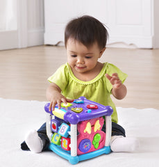 VTech Busy Learners Activity Cube side with sliders and spinners, builds fine motor skills