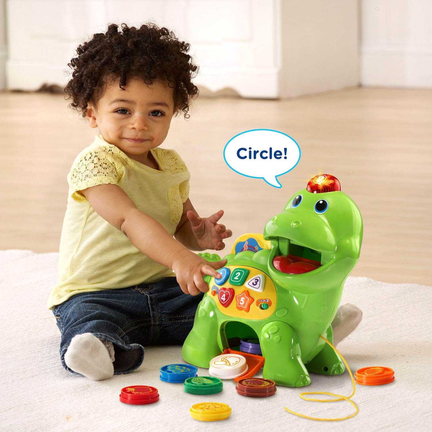 VTech toddler feeding the Dino, supporting counting and hand-eye coordination