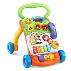 VTech close-up of five piano keys highlighting musical play benefit auditory development