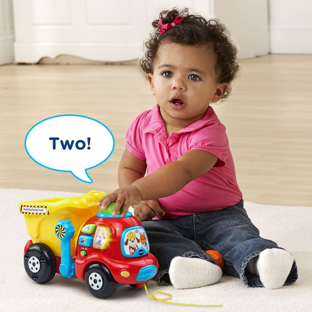 VTech three-button panel showing colors and melodies for early vocabulary