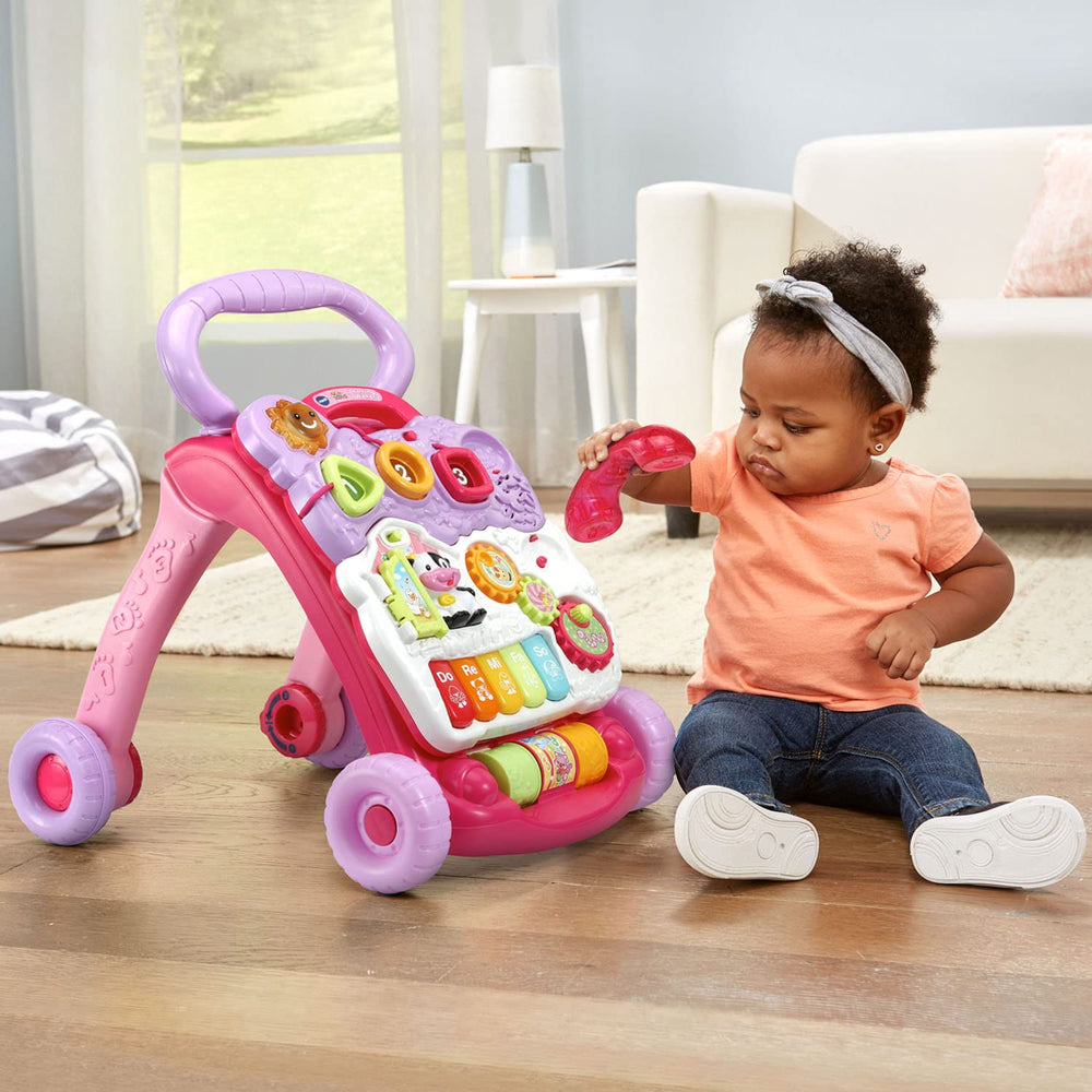 VTech telephone handset in hand supporting imaginative play and early speech practice