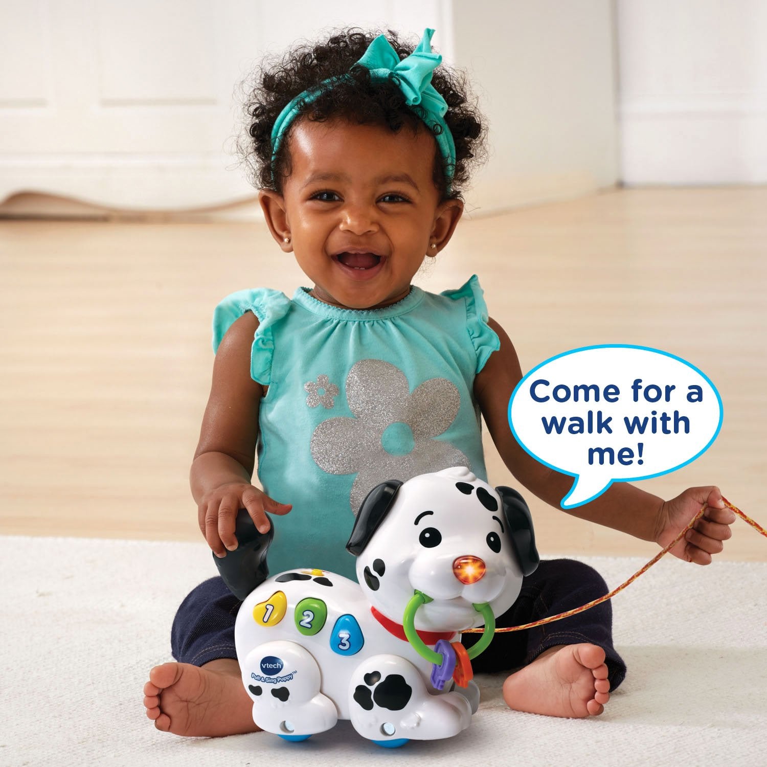 VTech puppy nose light detail flashing to attract attention and reinforce responses