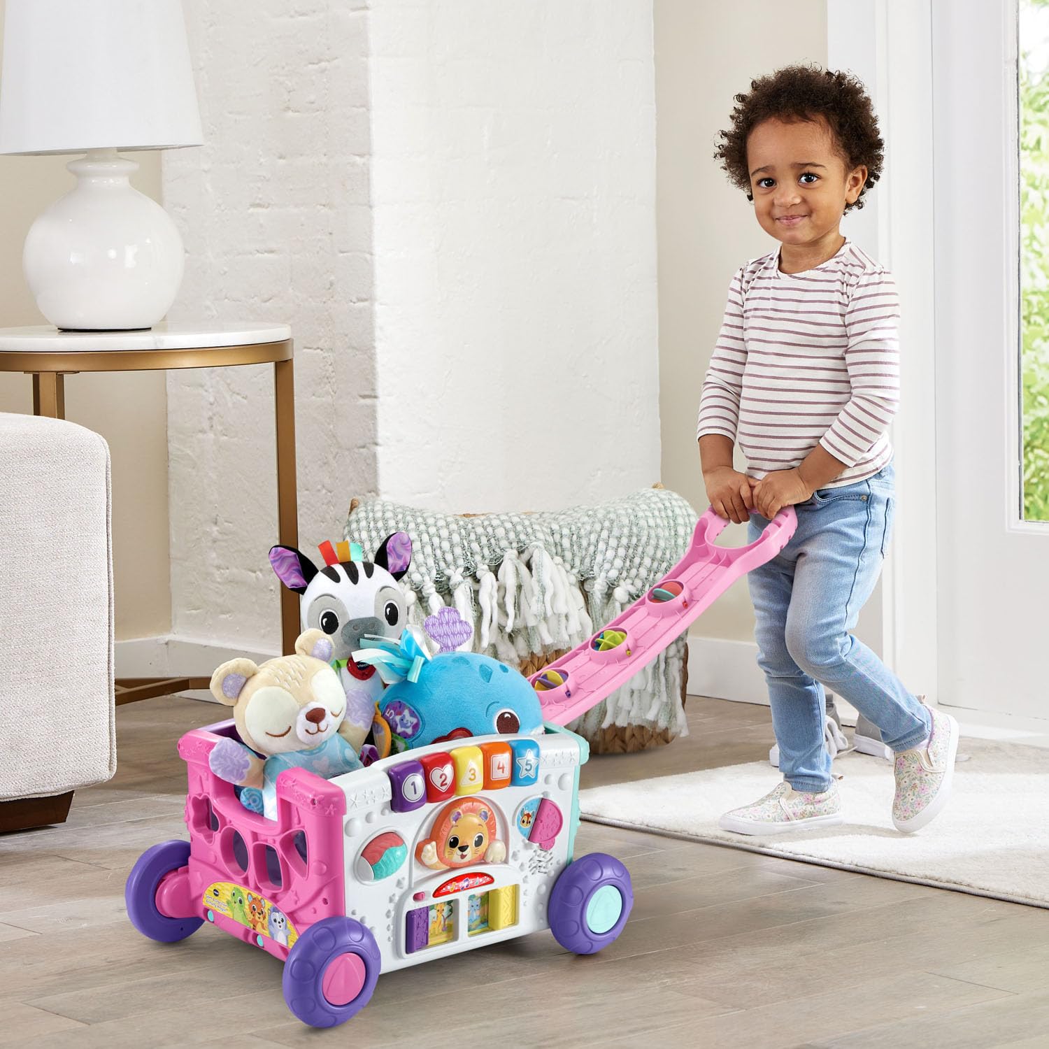 VTech interior storage filled with toys showing easy transport for outings