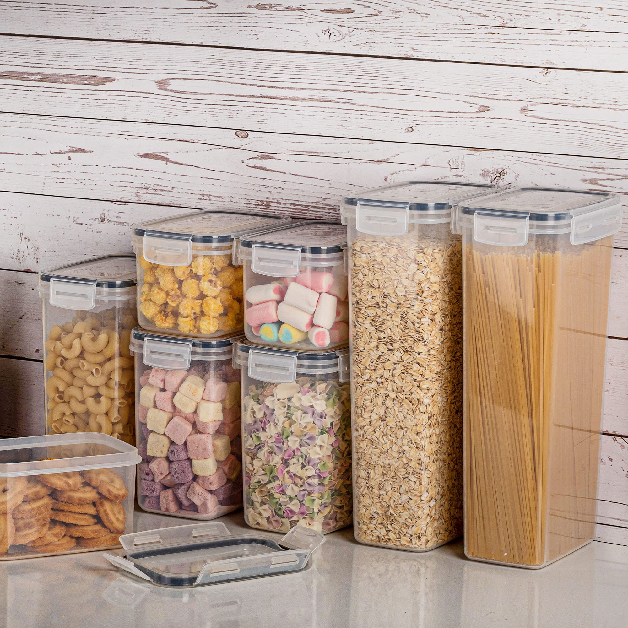 Vtopmart containers beside common kitchen items showing scale and storage capacity
