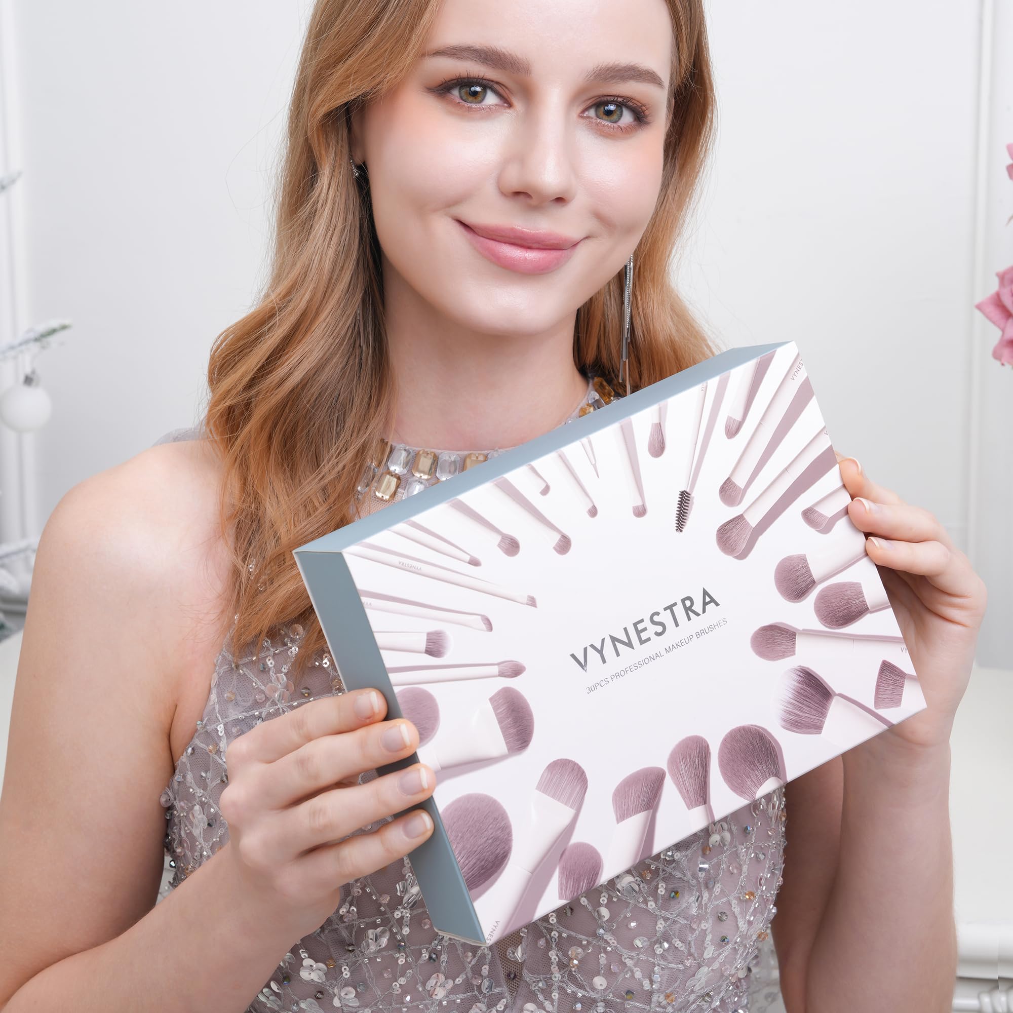 VYNESTRA brush held in hand displaying accurate size and control