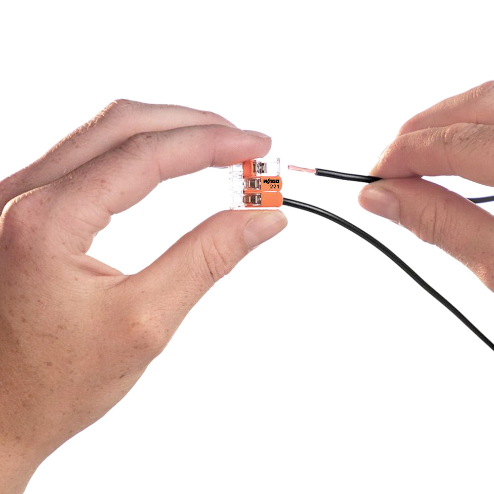 WAGO 221-413 with wires inserted to demonstrate correct seating and security