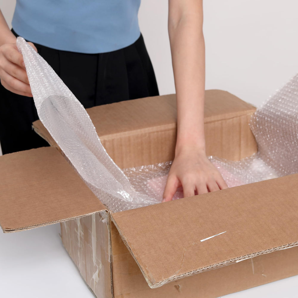 wanguagua taped box with label displaying flat outer side for secure taping and neat labeling