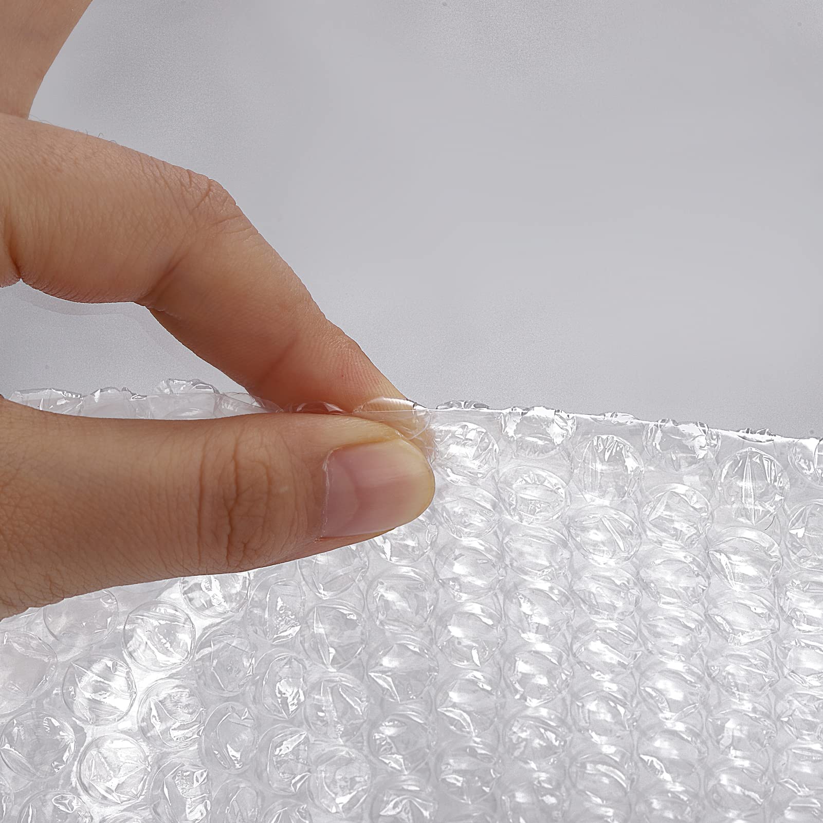wanguagua wrap on dishes demonstrating protective cushioning to reduce breakage during moves