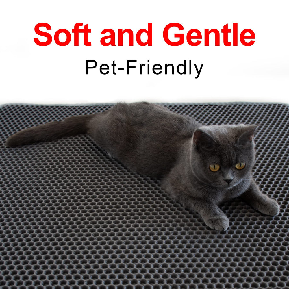 Waretary cat stepping off box onto mat for reduced tracking