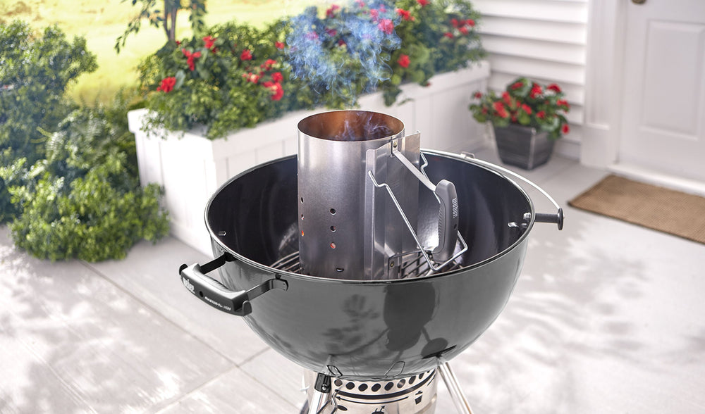 Weber Rapidfire in use with glowing charcoal illustrating fast, even coal ignition advantage