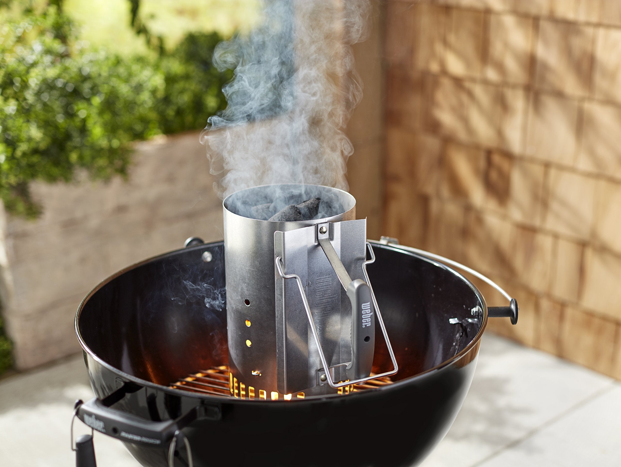 Weber Rapidfire next to kettle grill showing size and capacity for larger grilling sessions